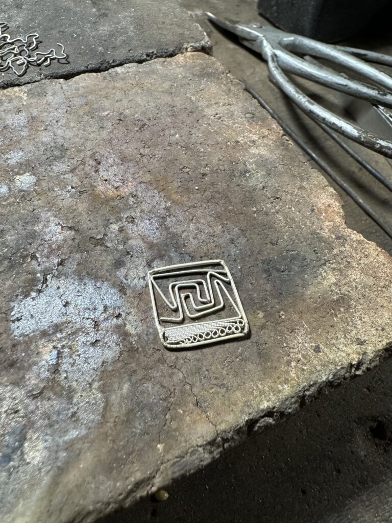 silver pendant half done