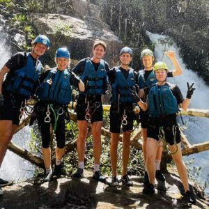 A six people group of two women and four men around 30 going Canyoning in Da Lat - Vietnam