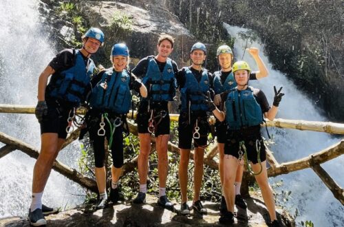 A six people group of two women and four men around 30 going Canyoning in Da Lat - Vietnam