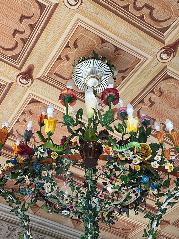 tin-wrought-nature-themed-chandelier