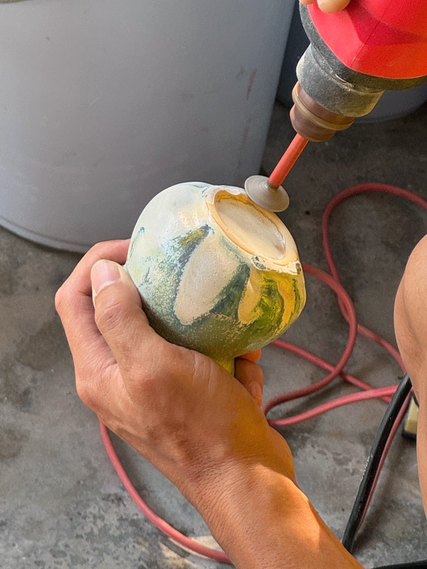 grinding-the-bottom-after-firing